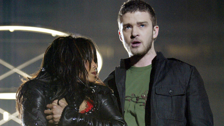 Janet Jackson covering chest next to Justin Timberlake