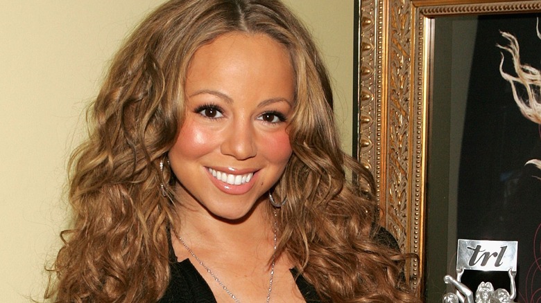 Mariah Carey wavy hair smile