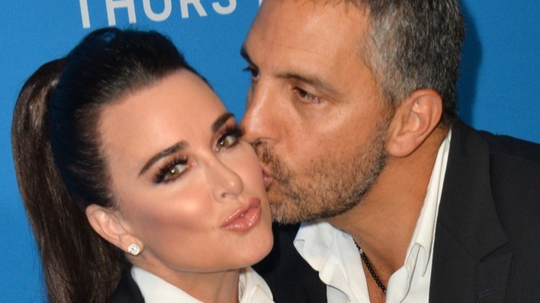 Mauricio Umansky kissing Kyle Richards