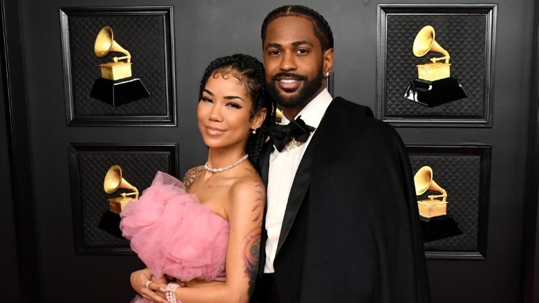 Big Sean arms around Jhené Aiko