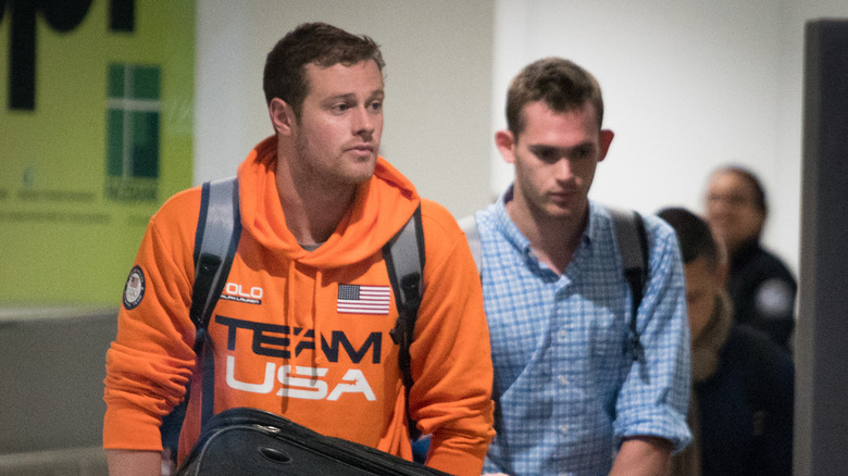 Jack Conger and Gunnar Bentz leaving the airport