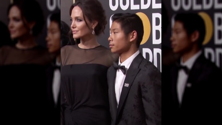 Angelina Jolie posing with Pax