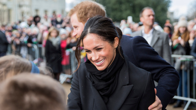 Meghan Markle shaking hands