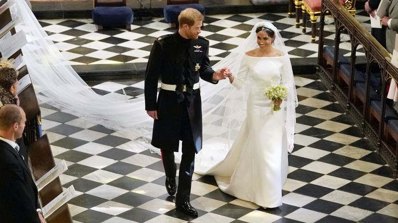 Prince Harry and Meghan Markle walking down the aisle