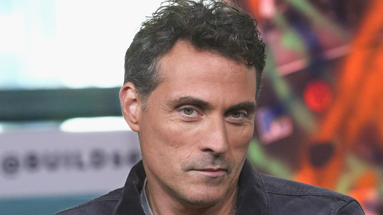 Rufus Sewell looking at camera