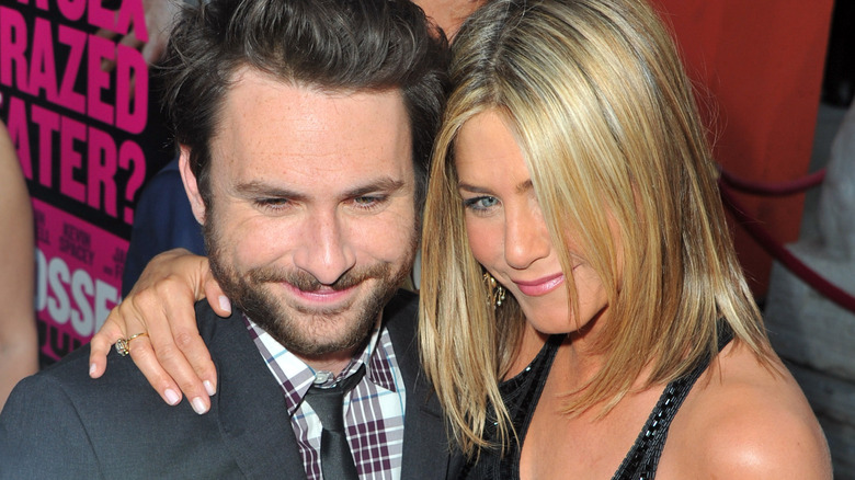 Charlie Day and Jennifer Aniston smiling 