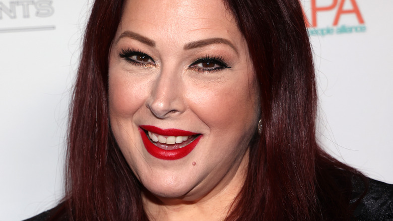 Carnie Wilson smiling with red lip