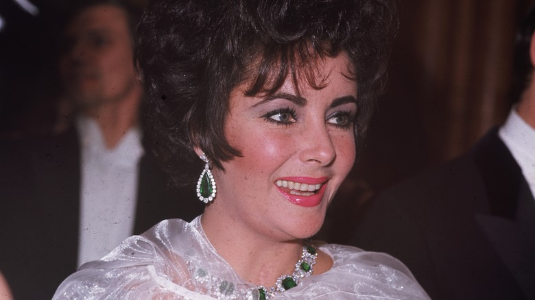 Elizabeth Taylor smiling at event