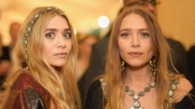 Ashley Olsen and Mary-Kate Olsen posing together