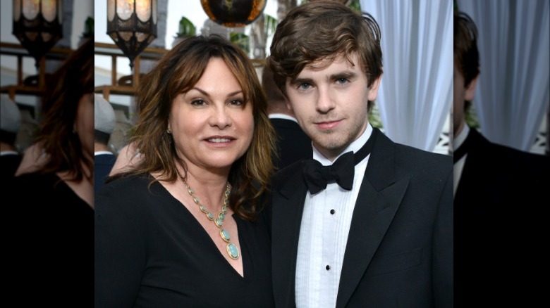 Sue Latimer and son Freddie Highmore in tux