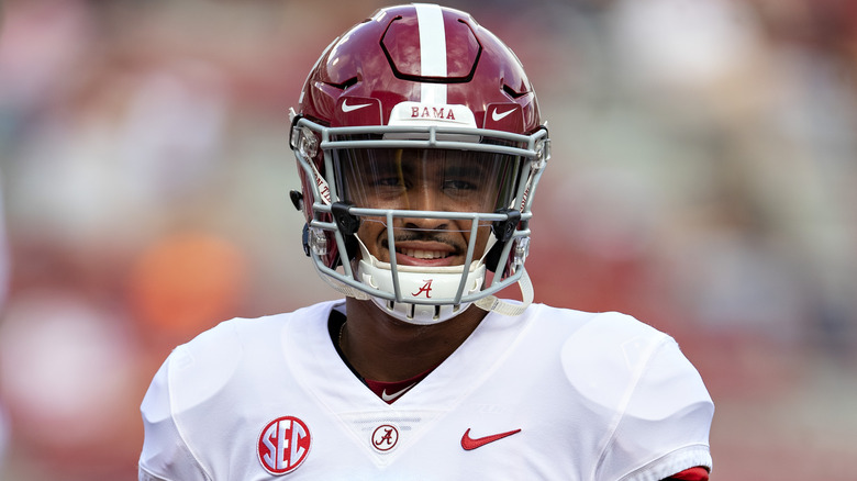 Jalen Hurts in football helmet, smiling