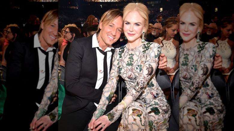 Keith Urban arm around Nicole Kidman smiling