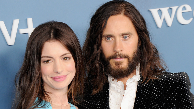 Anne Hathaway and Jared Leto posing