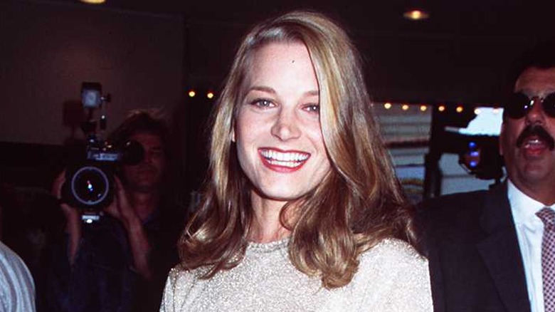 Bridget Fonda smiling widely