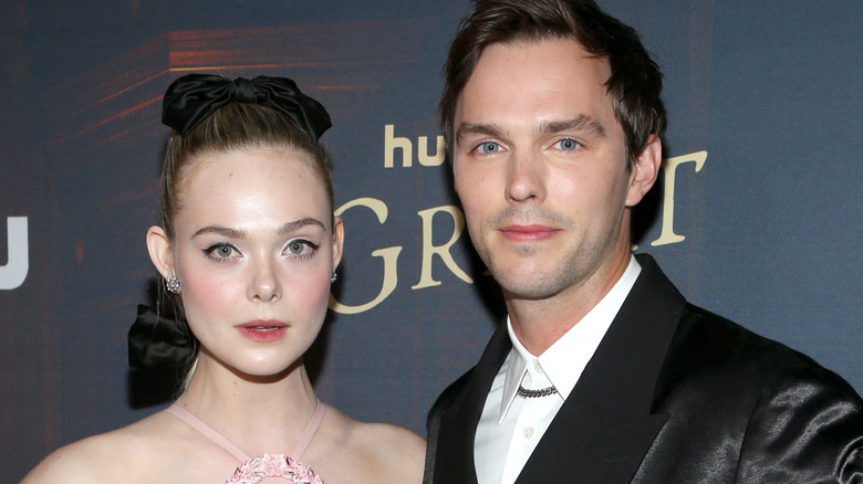 Elle Fanning and Nicholas Hoult posing