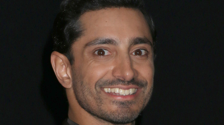 Riz Ahmed smiling