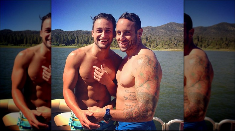 Carmine Sabatella and Ryan Delair smiling by lake