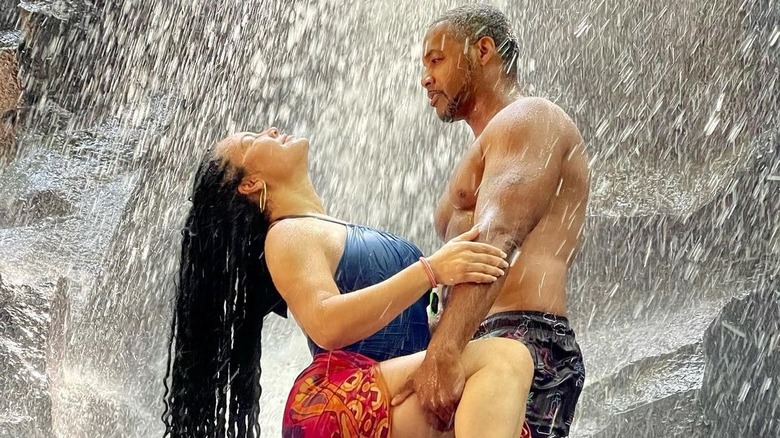 Egypt Sherrod,Mike Jackson underneath waterfall