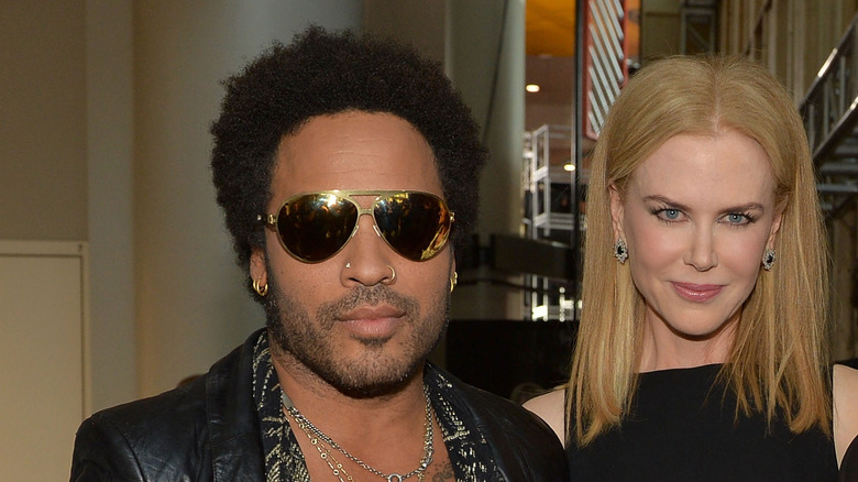 Lenny Kravitz and Nicole Kidman posing at an event