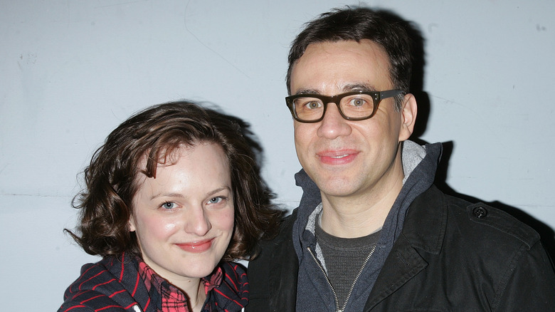 Elisabeth Moss and Fred Armisen smiling