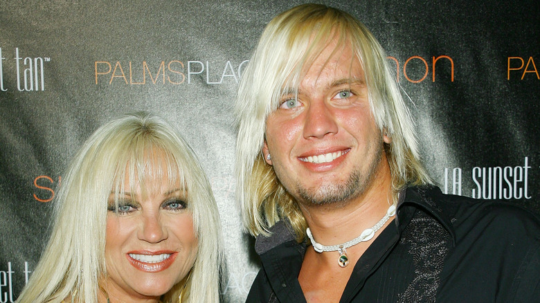 Linda Hogan and Charlie Hill posing at an event