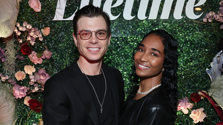 Matthew Lawrence and Chilli posing at an event