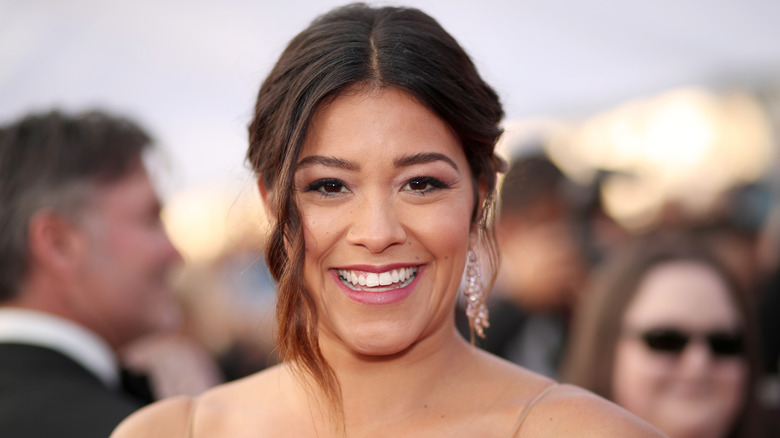 Gina Rodriguez posing at an event