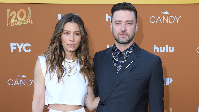 Jessica Biel with arm around Justin Timberlake