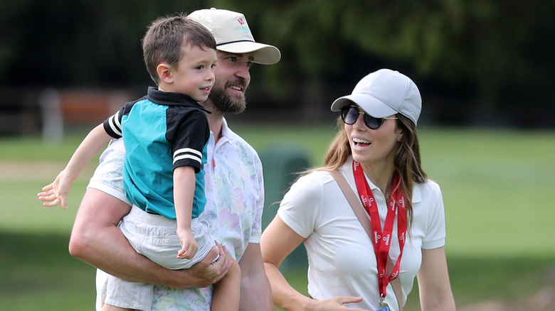 Justin Timberlake, Silas, and Jessica Biel walking