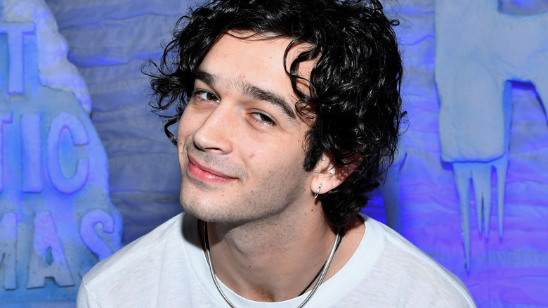 Matt Healy smirking