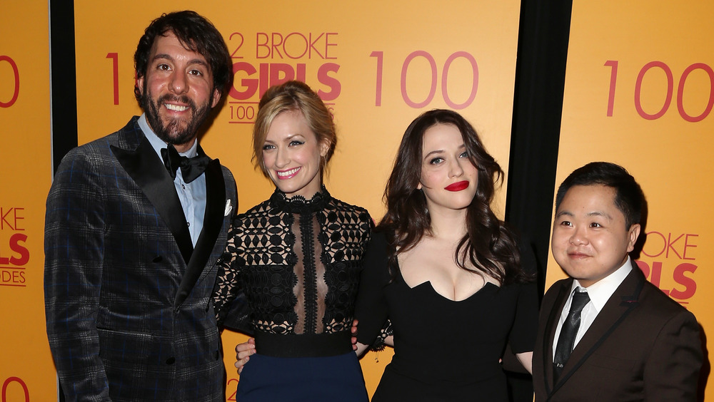 2 Broke Girls cast members on a red carpet