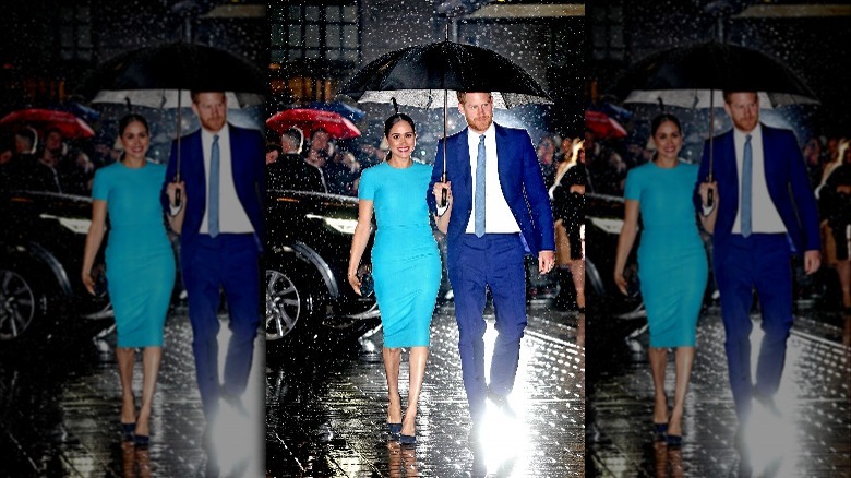 Meghan Markle and Prince Harry in the rain