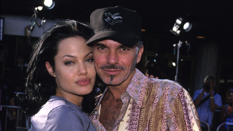 Angelina Jolie and Billy Bob Thornton embracing and posing