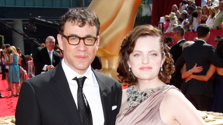 Elisabeth Moss and Fred Armisen posing on the red carpet