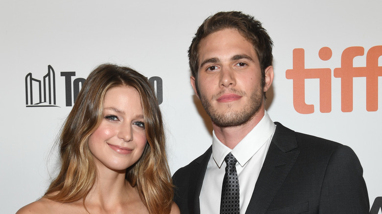 Melissa Benoist and Blake Jenner posing at an event