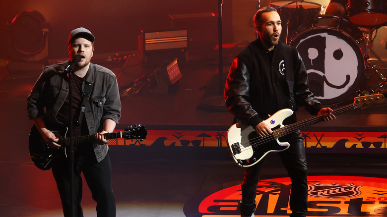 Patrick Stump and Pete Wentz performing