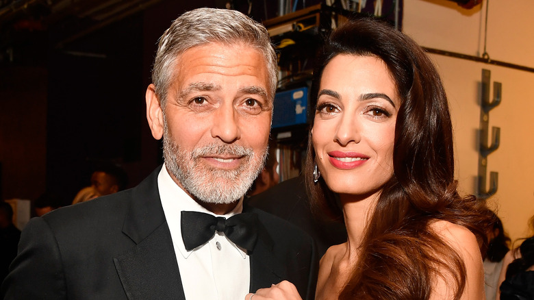 George and Amal Clooney smiling