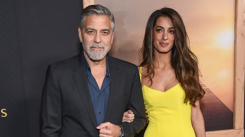 George and Amal Clooney posing