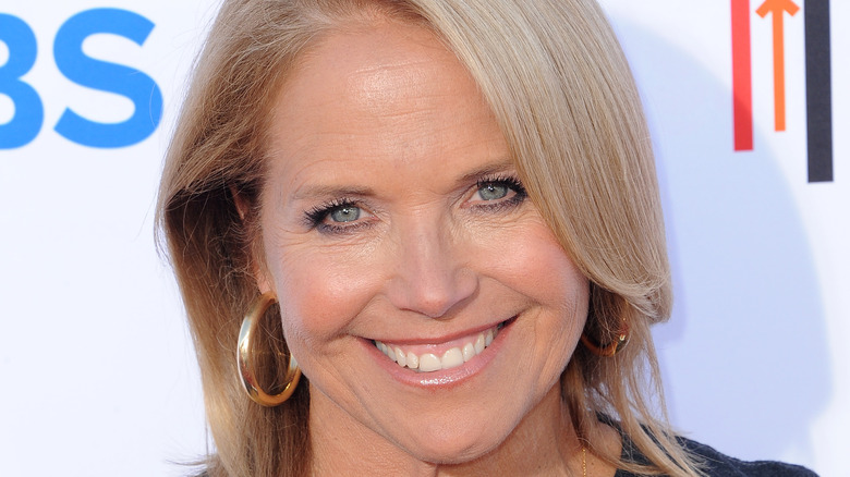 Katie Couric smiling mascara blue eyes blond hair