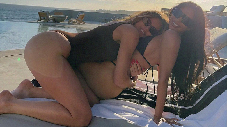 Khloe and Kim Kardashian hugging