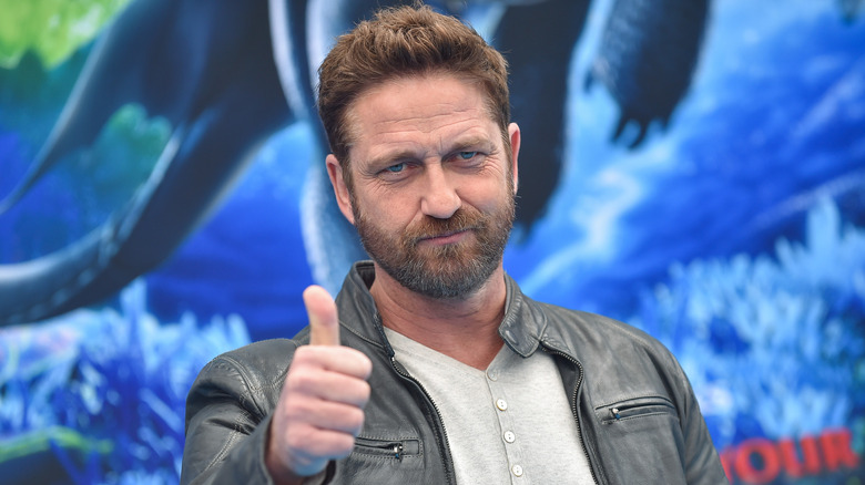 Gerard Butler giving a thumbs up