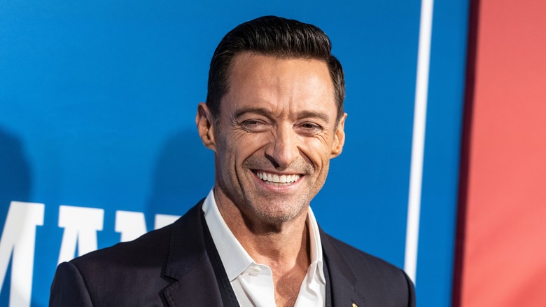 Hugh Jackman posing on a red carpet