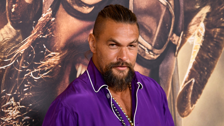 Jason Momoa posing at an event