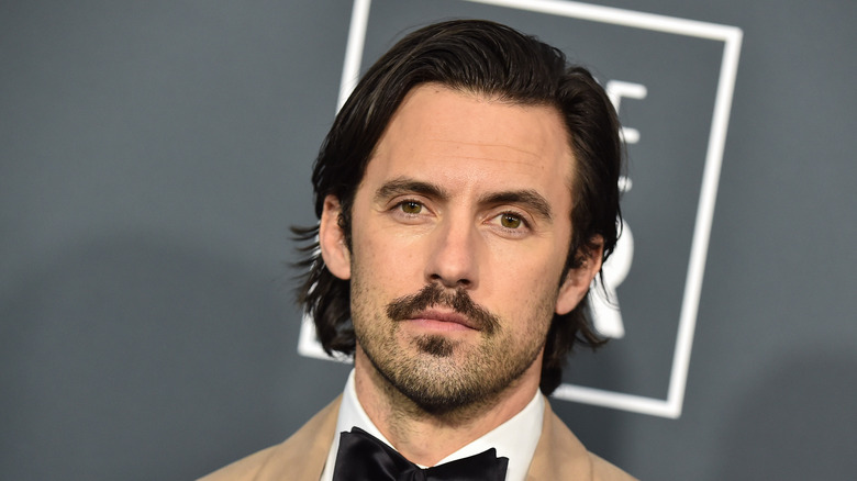 Milo Ventimiglia posing at an event