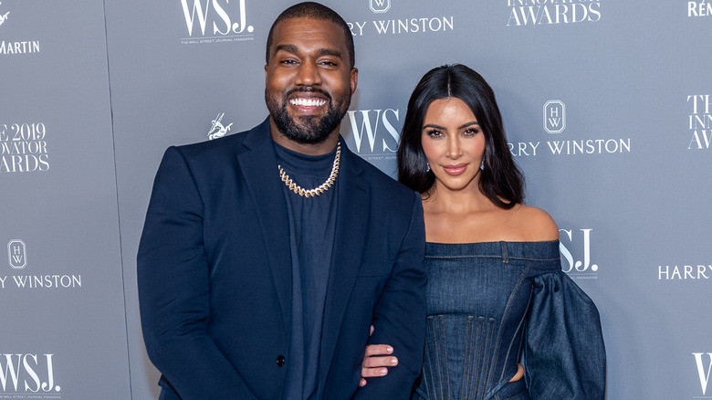 Kanye West and Kim Kardashian smiling