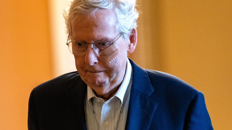 Mitch McConnell with bandage on face