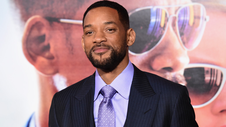 Will Smith, smirking