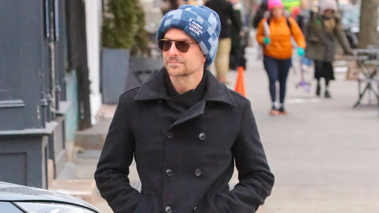  Bradley Cooper wearing a blue hat