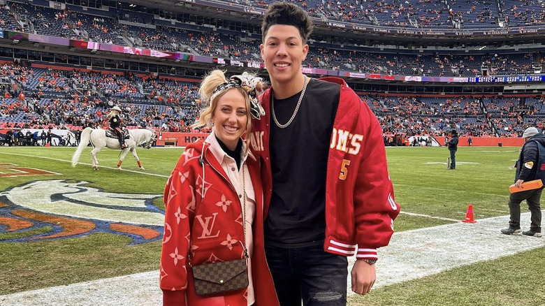 Brittany Mahomes posing with Jackson