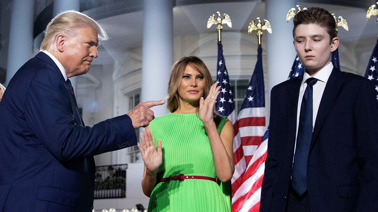 Melania Donald pointing Barron Trump